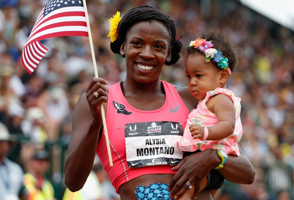 Olympic runner Alysia Montano poses with her daughter Liliana after a race